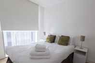 ห้องนอน Times Square Serviced Apartments