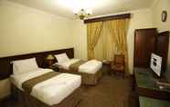 Bedroom 5 Bahaa Al zahra Hotel