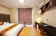 Kamar Tidur 4 Weihai Airsun Apart-Hotel