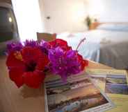 Bedroom 6 Villaggio Borgo Marino