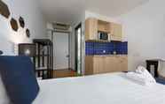 Bilik Tidur 2 Lugano Center GuestHouse