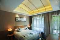 ห้องนอน Wuzhen Mingli Hotel