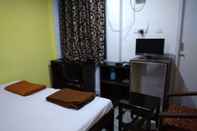 Phòng ngủ Hotel Shriram