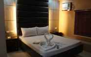 Kamar Tidur 6 El Vistra Travellers Inn & Coffee Shop