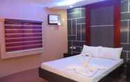 Kamar Tidur 7 El Vistra Travellers Inn & Coffee Shop