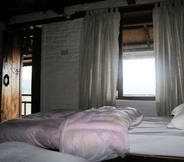 Bedroom 4 Dhampus Village Eco Lodge