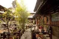 ภายนอกอาคาร Lijiang Taohuadao Post Inn