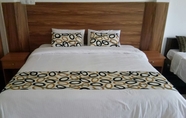 Kamar Tidur 4 Mangroven River View Hotel