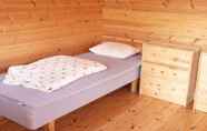 Bedroom 5 Hammarstrands Camping, Stugby och Fiske