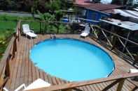 Kolam Renang South Beach Guest House - Hostel