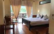 Kamar Tidur 3 Riverview Bungalows & GH