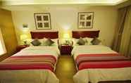 Kamar Tidur 4 Estay Resort Happiness Garden Lijiang