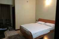 ห้องนอน Hotel B M Shree Residency