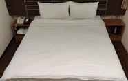 Kamar Tidur 6 Jhong-Sing Hotel