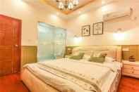 Kamar Tidur Wuzhen HE & SHE Inn