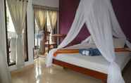 Kamar Tidur 7 Yunni Guesthouse