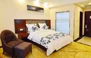 Bedroom 6 GreenTree Inn Wuxi Xidong Xincheng High Speed Rail East Station Hotel