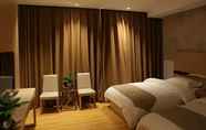 Phòng ngủ 4 GreenTree Inn Dali Erhai Binhai Ave Seaview Business Hotel