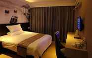 Bedroom 6 GreenTree Inn Huzhou Wuxing District South Street Chaoyin Bridge Business Hotel
