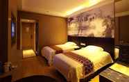 Bedroom 2 GreenTree Inn Huzhou Wuxing District South Street Chaoyin Bridge Business Hotel