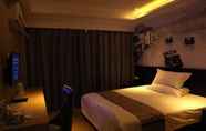 Bedroom 5 GreenTree Inn Huzhou Wuxing District South Street Chaoyin Bridge Business Hotel