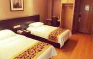 Bedroom 3 GreenTree Inn Huzhou Wuxing District South Street Chaoyin Bridge Business Hotel