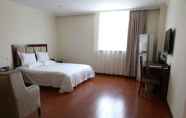 Bedroom 2 GreenTree Inn Wuxi New District North Changjiang Road Jincheng Road Express Hotel