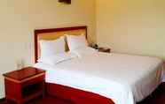 Bedroom 2 GreenTree Inn Nantong Gangzha District HongMing Plaza Express Hotel