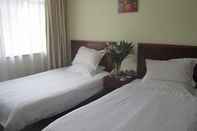 ห้องนอน GreenTree Inn Nantong Tongzhou Bus Station Express Hotel