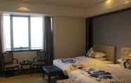 Kamar Tidur 6 Chu Tian Yin Xing Hotel