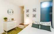 Bedroom 2 Bairro Alto Green by Homing