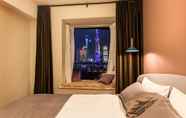 Kamar Tidur 4 Wonderoom Design Apartment on the Bund