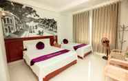 Kamar Tidur 5 Dang Quang Guesthouse