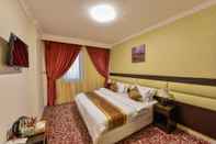 Phòng ngủ Bader Al Marsa Hotel