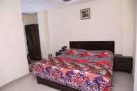 Bedroom Hotel Apple Villa by Sushant Travels