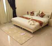 Bedroom 4 Al Amoria Furnished Apartments 1