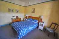 Kamar Tidur Brigalow Cottage