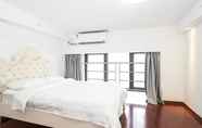 Kamar Tidur 4 YUMI Apartment-Shiqiao Station Branch