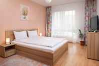 ห้องนอน Brasov Holiday Apartments