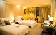 Bedroom 4 Luoyang Yilu Gangwan Hotel