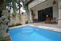 Swimming Pool Sama's Cottages and Villas