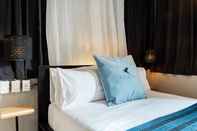 Bedroom Capitol Robinson by Bower Hotels & Suites