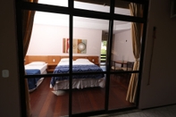 Kamar Tidur Neblina Park Hotel