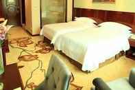 ห้องนอน Vienna Hotel