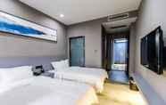 Kamar Tidur 6 Qianmo Art Hotel