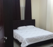 Bedroom 2 Golden Seasons Furnished Apartments 1