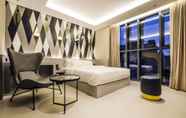 Kamar Tidur 3 Hotel The Designers Premier Kondae