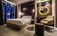 Kamar Tidur 5 Hotel The Designers Premier Kondae