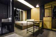 Kamar Tidur Hotel The Designers Premier Kondae