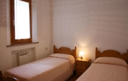 Bedroom 4 Beautiful private villa for 12 people with WIFI, private pool and parking, close to Montepulciano